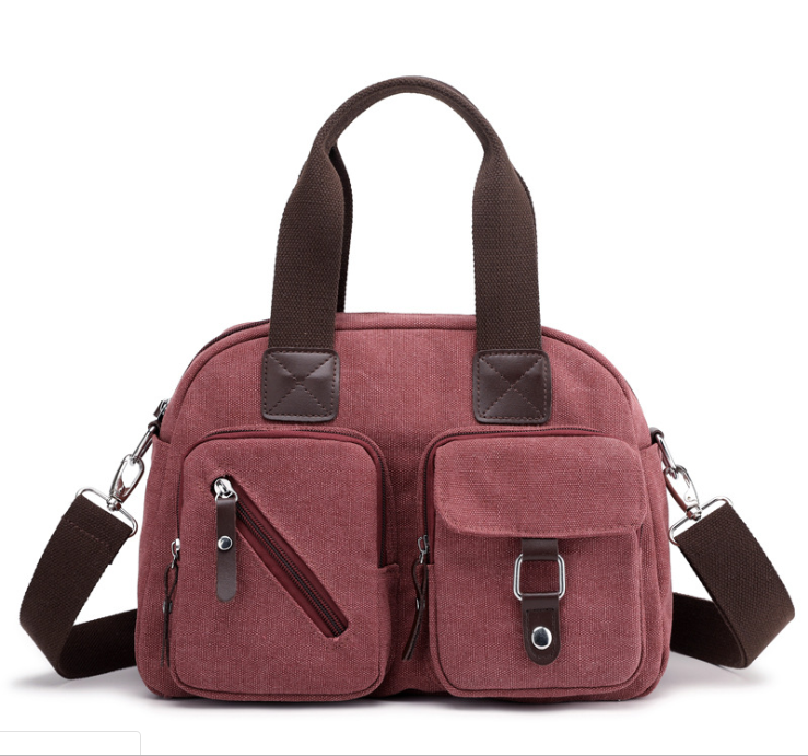 High Quality Canvas Messenger Bag for Ladies in plain design, featuring a soft handle and zipper closure, perfect for casual outings.