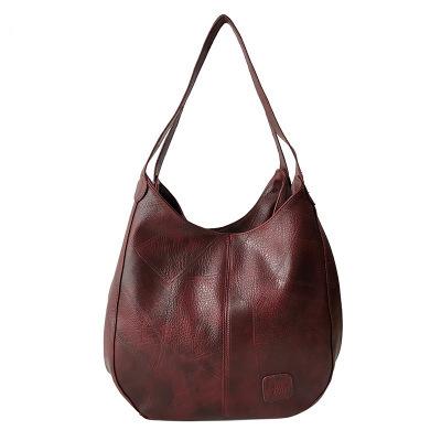 High Quality Casual Fashion Handbag for Women in PU leather, featuring a soft structure, multiple interior pockets, and stylish letter decoration.