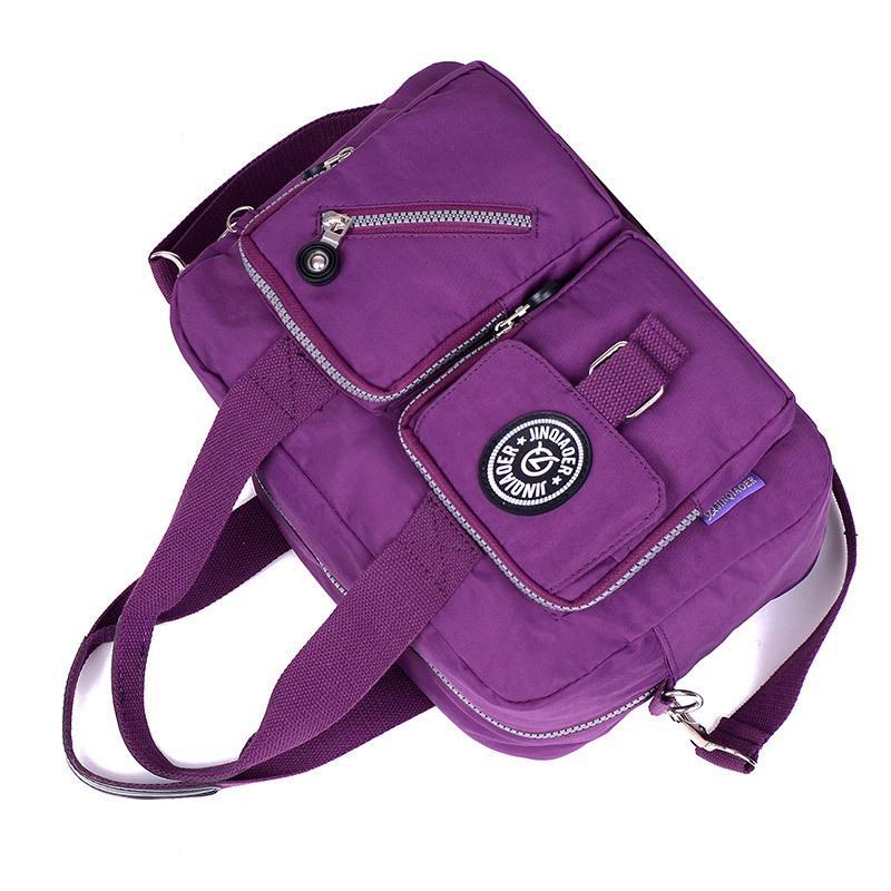 High Quality Fashion One-shoulder Crossbody Bag in waterproof nylon, featuring an adjustable strap and stylish design, ideal for leisure and parties.