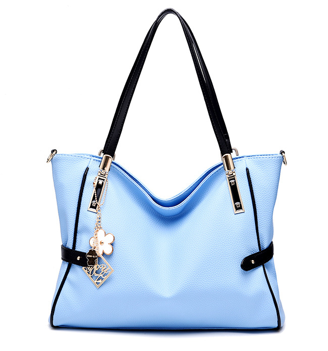 High Quality Large Capacity Handbag for Women in soft PU material, featuring a zipper closure and spacious interior with pockets for organization.