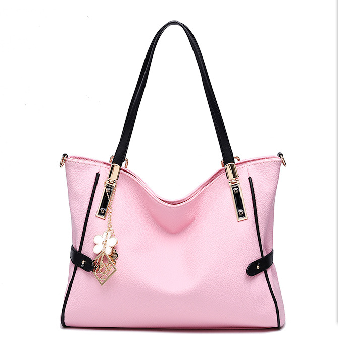 High Quality Large Capacity Handbag for Women in soft PU material, featuring a zipper closure and spacious interior with pockets for organization.