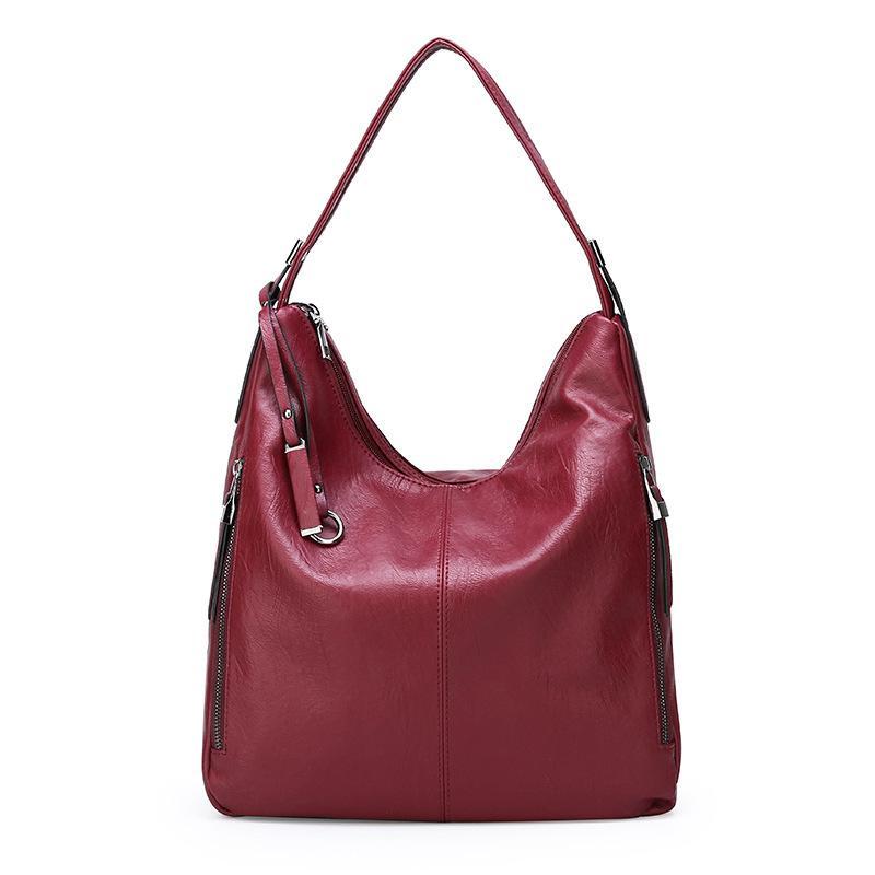 High Quality Soft Leather Shoulder Bag for young ladies, featuring a stylish design and spacious interior, made from durable PU leather.