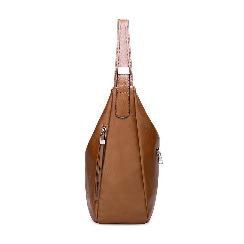 High Quality Soft Leather Shoulder Bag for young ladies, featuring a stylish design and spacious interior, made from durable PU leather.