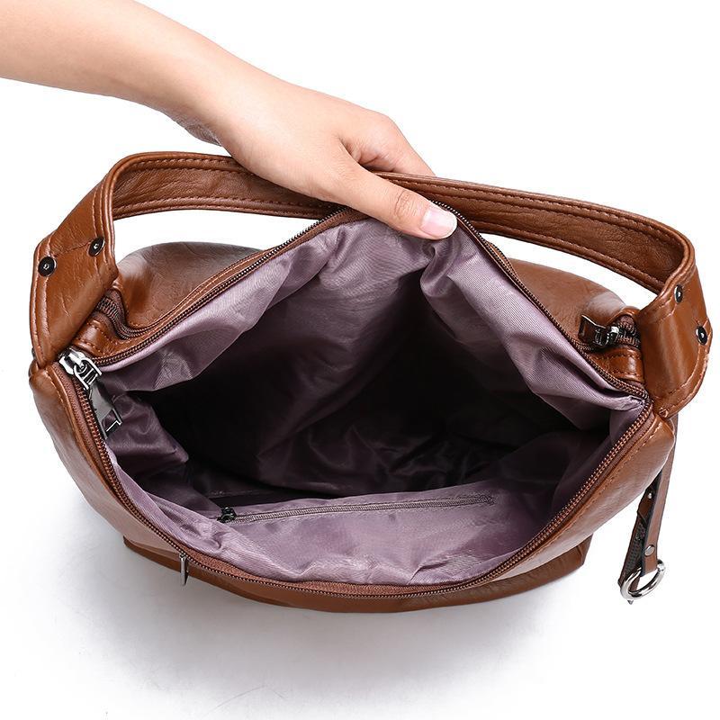 High Quality Soft Leather Shoulder Bag for young ladies, featuring a stylish design and spacious interior, made from durable PU leather.