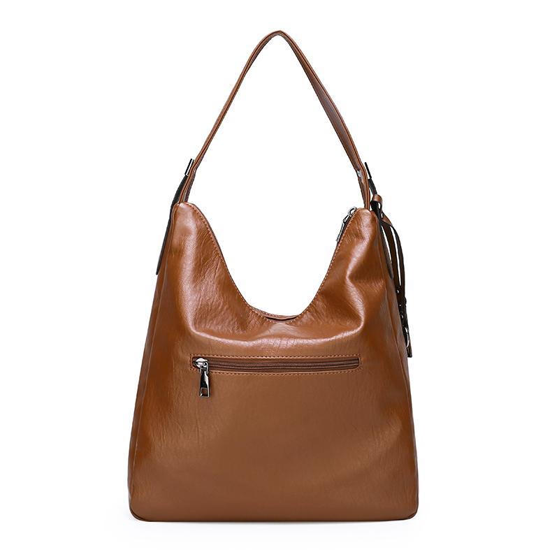 High Quality Soft Leather Shoulder Bag for young ladies, featuring a stylish design and spacious interior, made from durable PU leather.