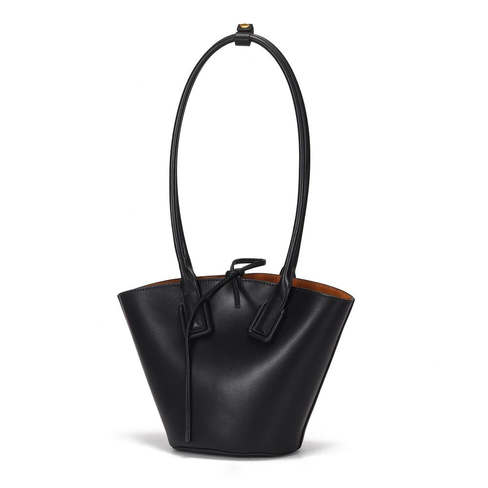 High Quality Women's Special Fashion Shoulder Bag in bucket shape, made from cowhide and polyester cotton, showcasing its stylish design and compact size.