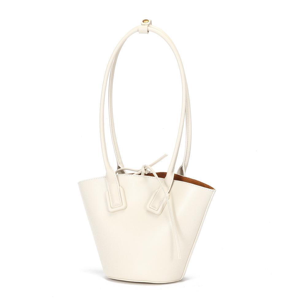 High Quality Women's Special Fashion Shoulder Bag in bucket shape, made from cowhide and polyester cotton, showcasing its stylish design and compact size.