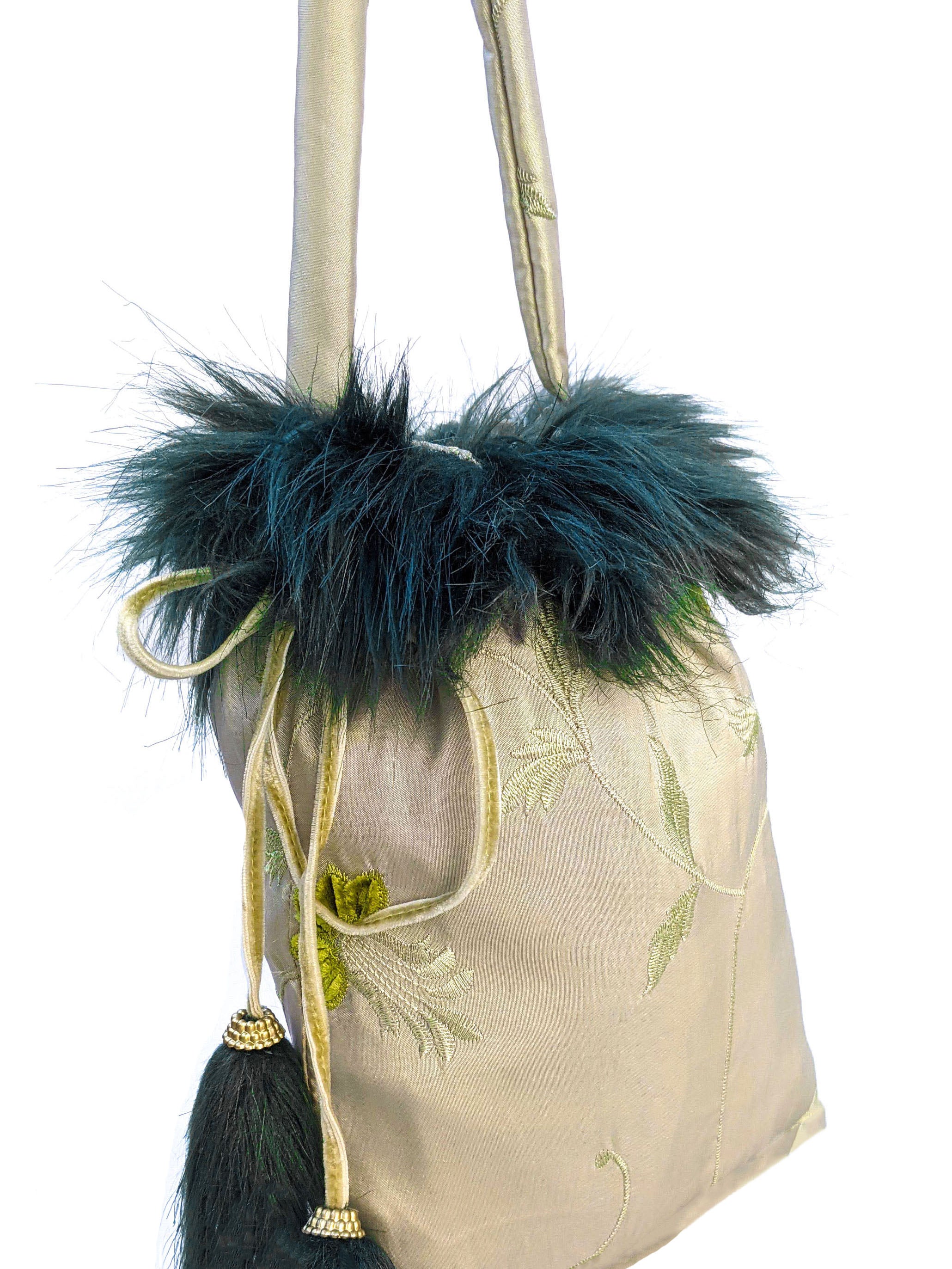 Kambaba Jasper pouch bag featuring dark green fur details and water green velvet string, elegantly designed with self-embossed taffeta.