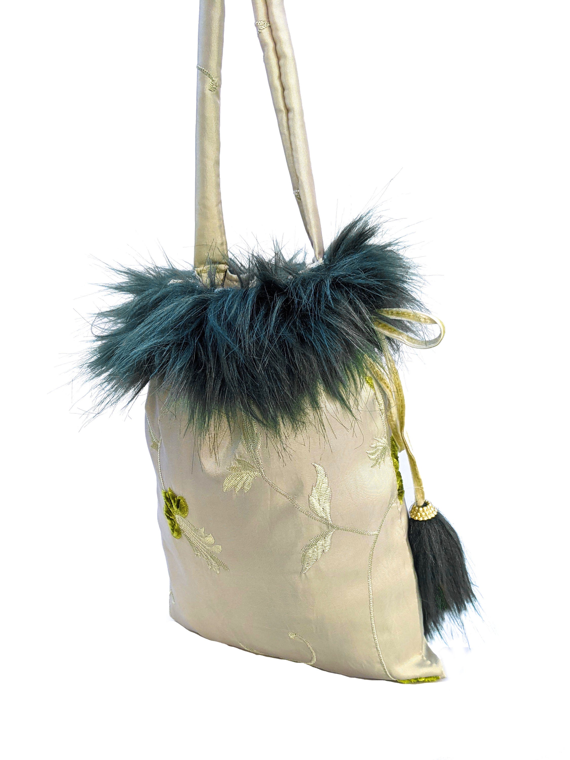 Kambaba Jasper pouch bag featuring dark green fur details and water green velvet string, elegantly designed with self-embossed taffeta.