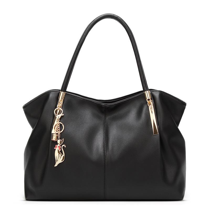 Large capacity solid color fashion handbag for women, featuring a stylish dumpling shape and multiple internal pockets.