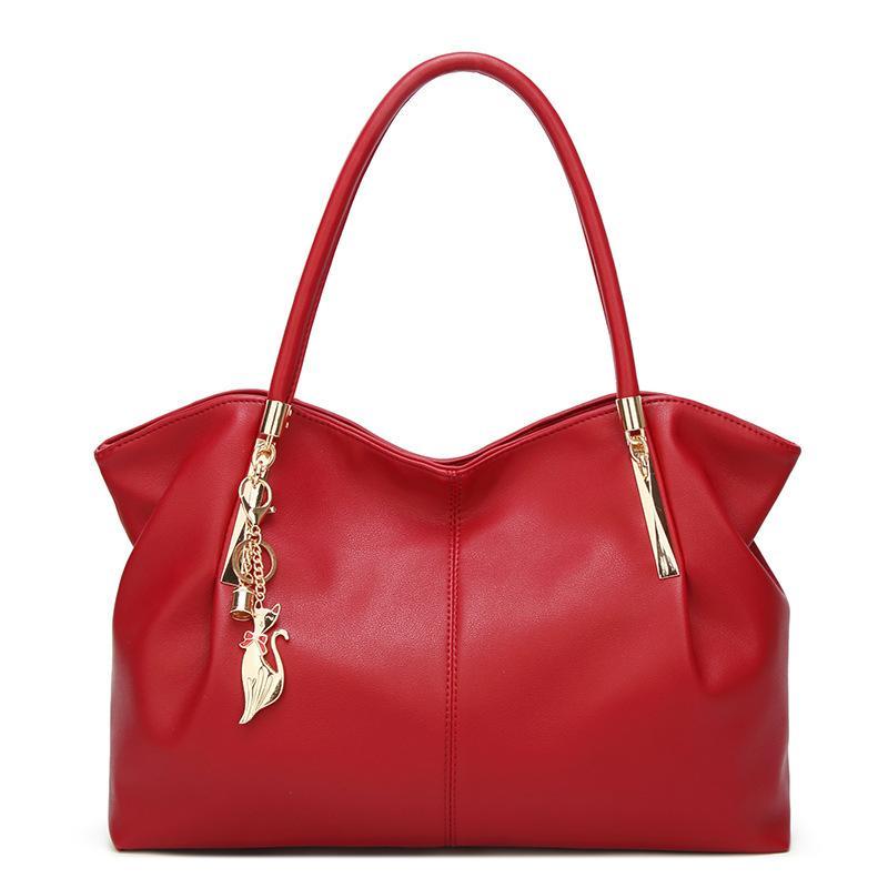 Large capacity solid color fashion handbag for women, featuring a stylish dumpling shape and multiple internal pockets.