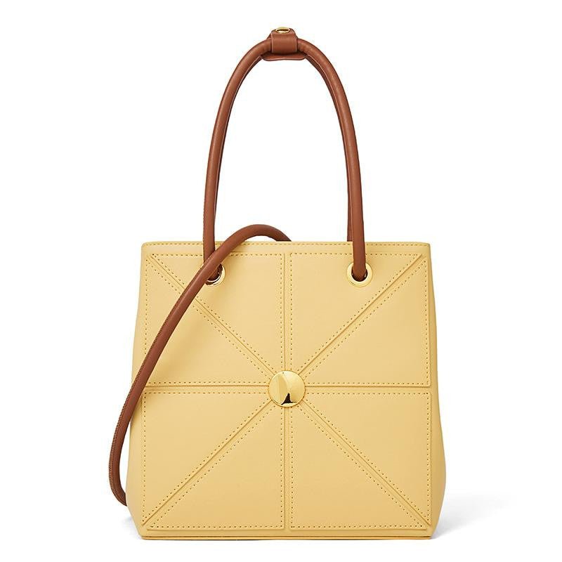 Lauren Crossbody bag in Vanilla color with gold hardware, showcasing its stylish design and genuine leather material.