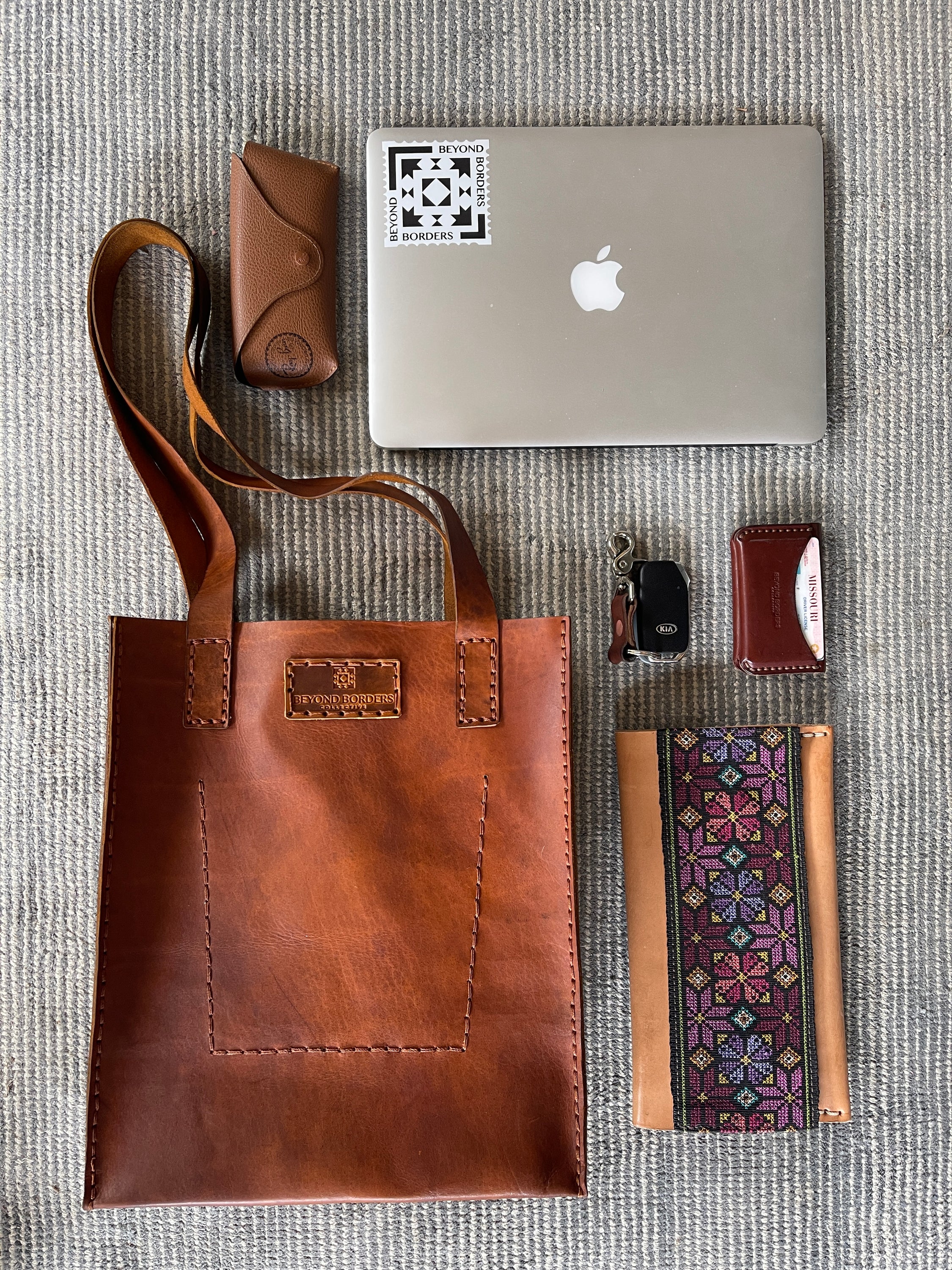 Handcrafted Leather Tote Bag made from full grain leather, showcasing unique natural imperfections and a spacious design.