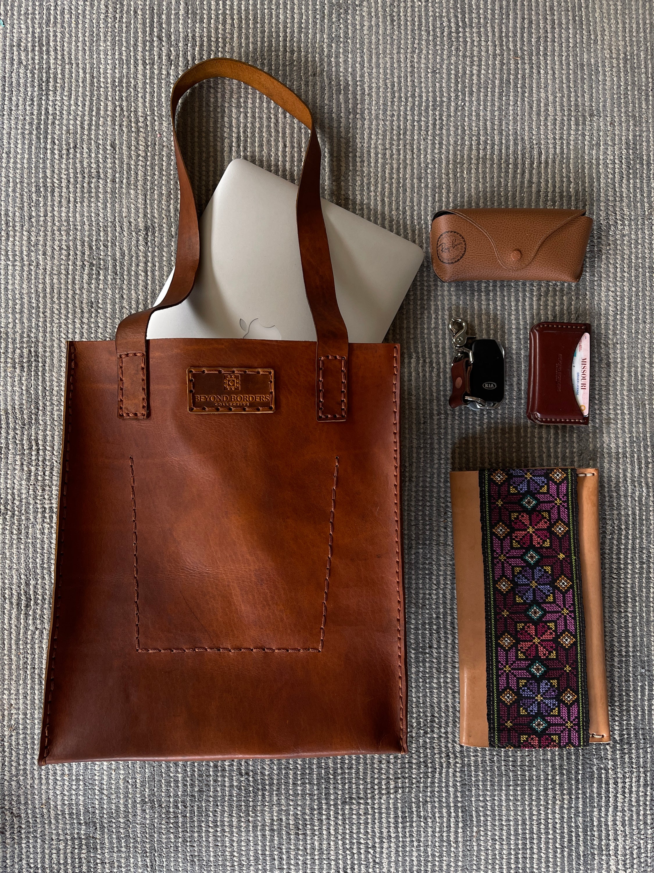 Handcrafted Leather Tote Bag made from full grain leather, showcasing unique natural imperfections and a spacious design.