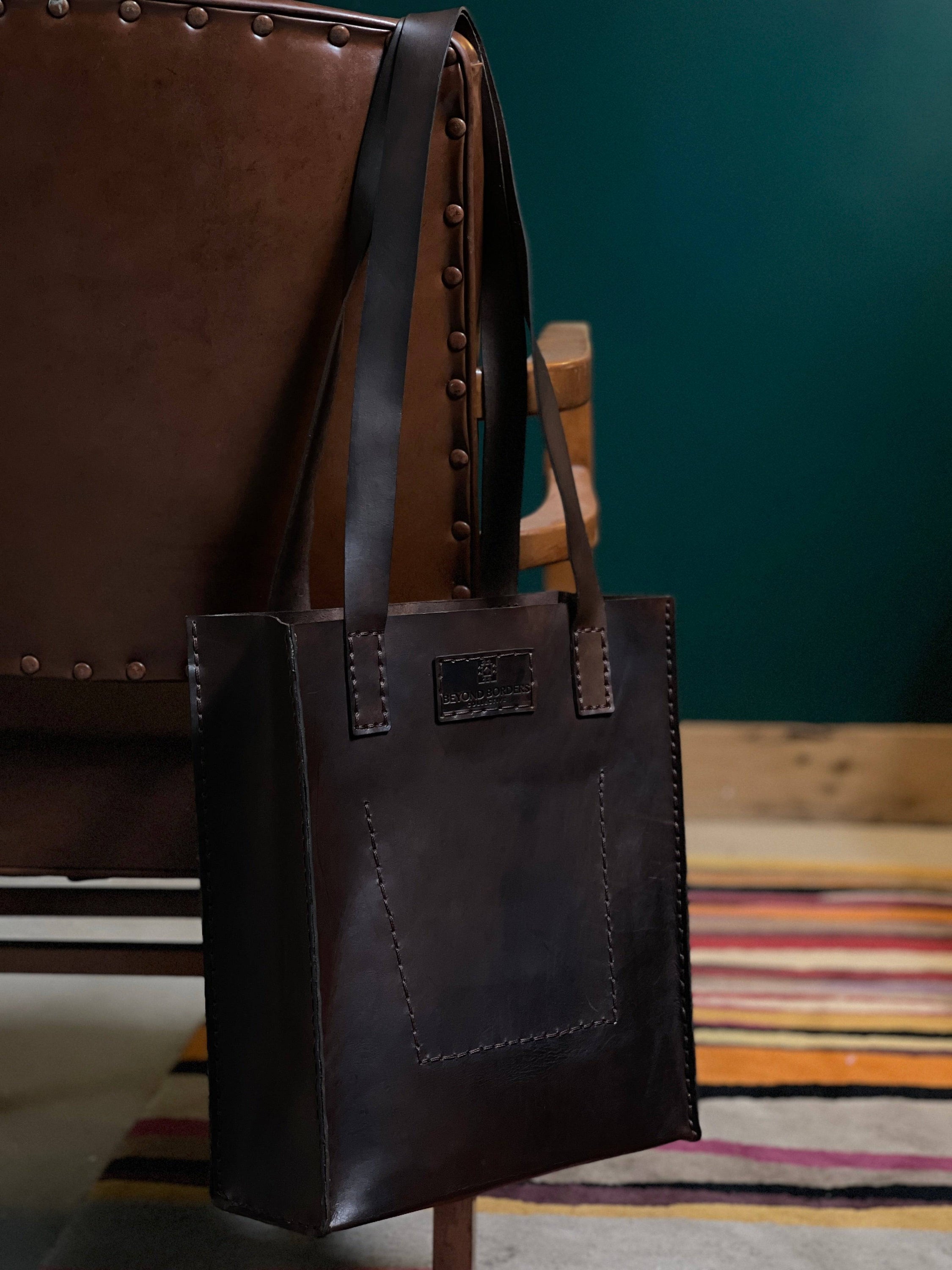 Handcrafted Leather Tote Bag made from full grain leather, showcasing unique natural imperfections and a spacious design.