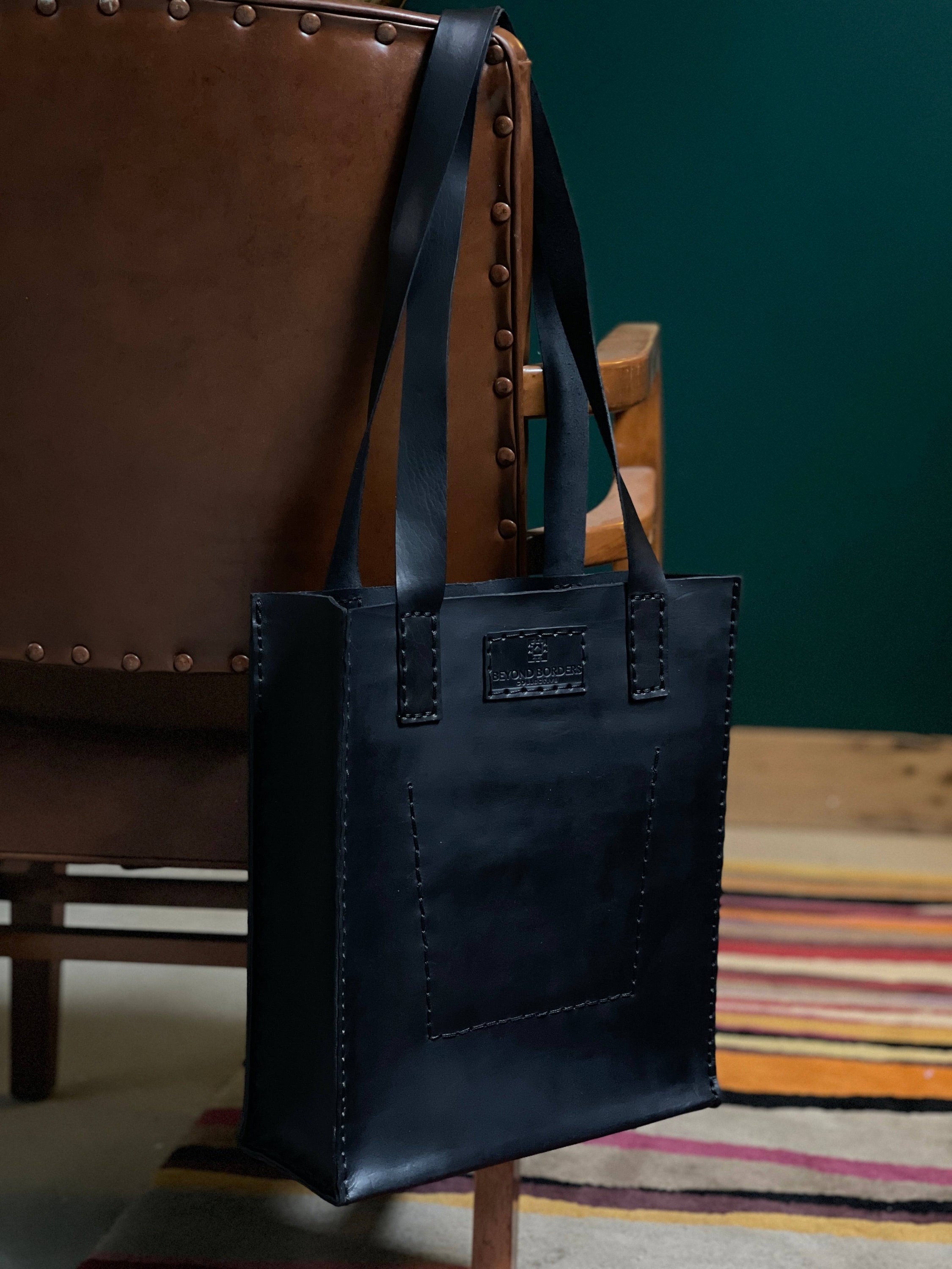 Handcrafted Leather Tote Bag made from full grain leather, showcasing unique natural imperfections and a spacious design.