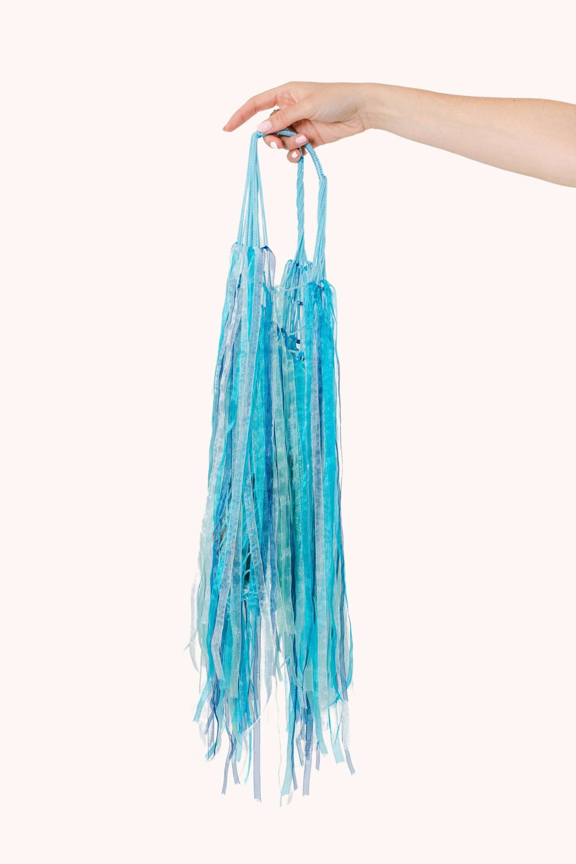 Cyan cotton net bag with turquoise ribbons, inspired by moon jellyfish, featuring a pouch bag inside.