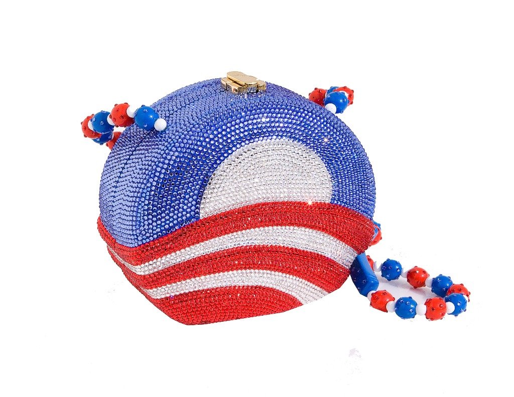 A luxurious Obama Logo Bag adorned with 10,000 Swarovski crystals, featuring a beaded strap with stars and stripes, showcasing American pride.