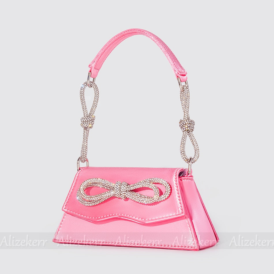 Elegant Order 5 bag made of soft satin with flap design, adorned with bow and diamonds, perfect for versatile occasions.