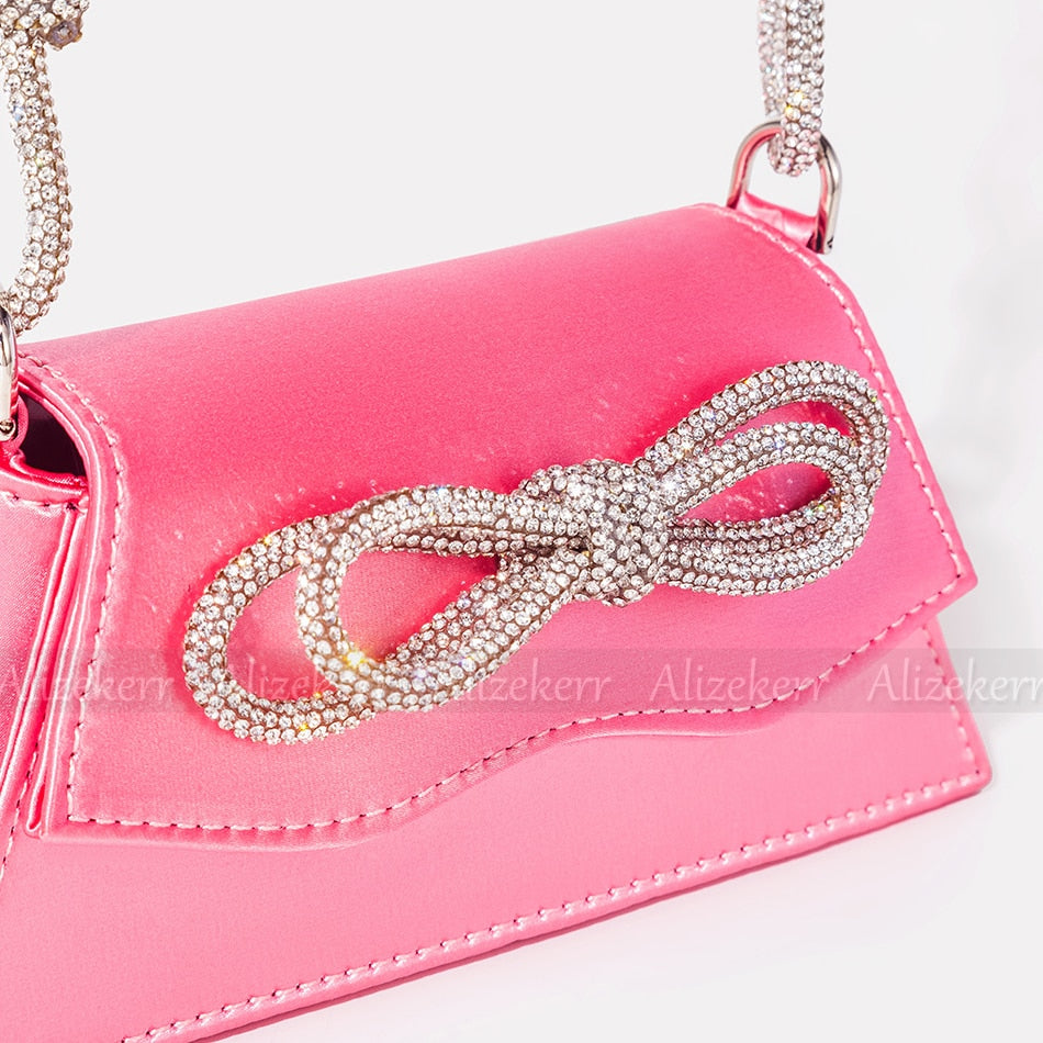 Elegant Order 5 bag made of soft satin with flap design, adorned with bow and diamonds, perfect for versatile occasions.