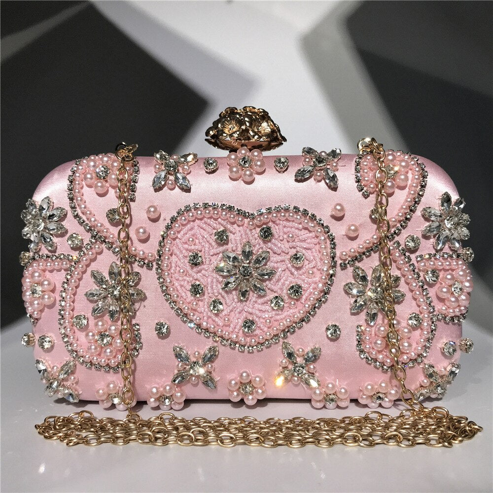 Satin vintage evening bag for women featuring a metal flower design and luxury diamonds, perfect for parties.