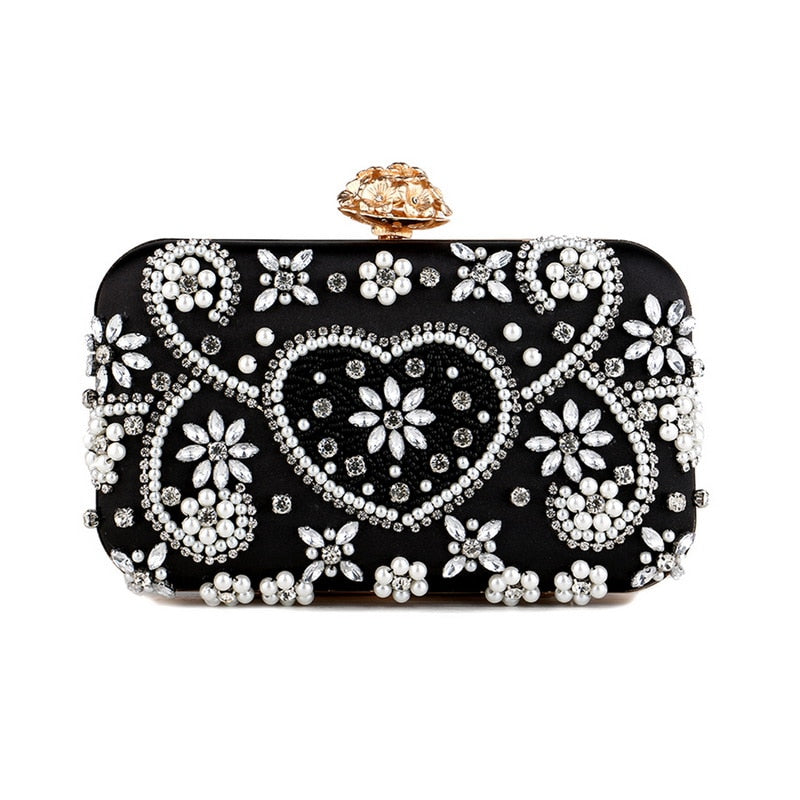 Satin vintage evening bag for women featuring a metal flower design and luxury diamonds, perfect for parties.