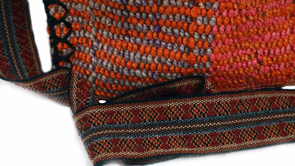 Simple Horizon Messenger Bag featuring intricate hopsack weaving in earthy colors, crafted by Quechua artisans with a durable alpaca strap.