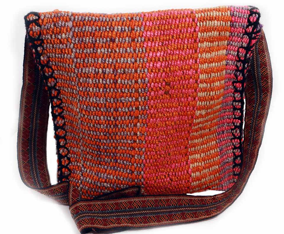 Simple Horizon Messenger Bag featuring intricate hopsack weaving in earthy colors, crafted by Quechua artisans with a durable alpaca strap.