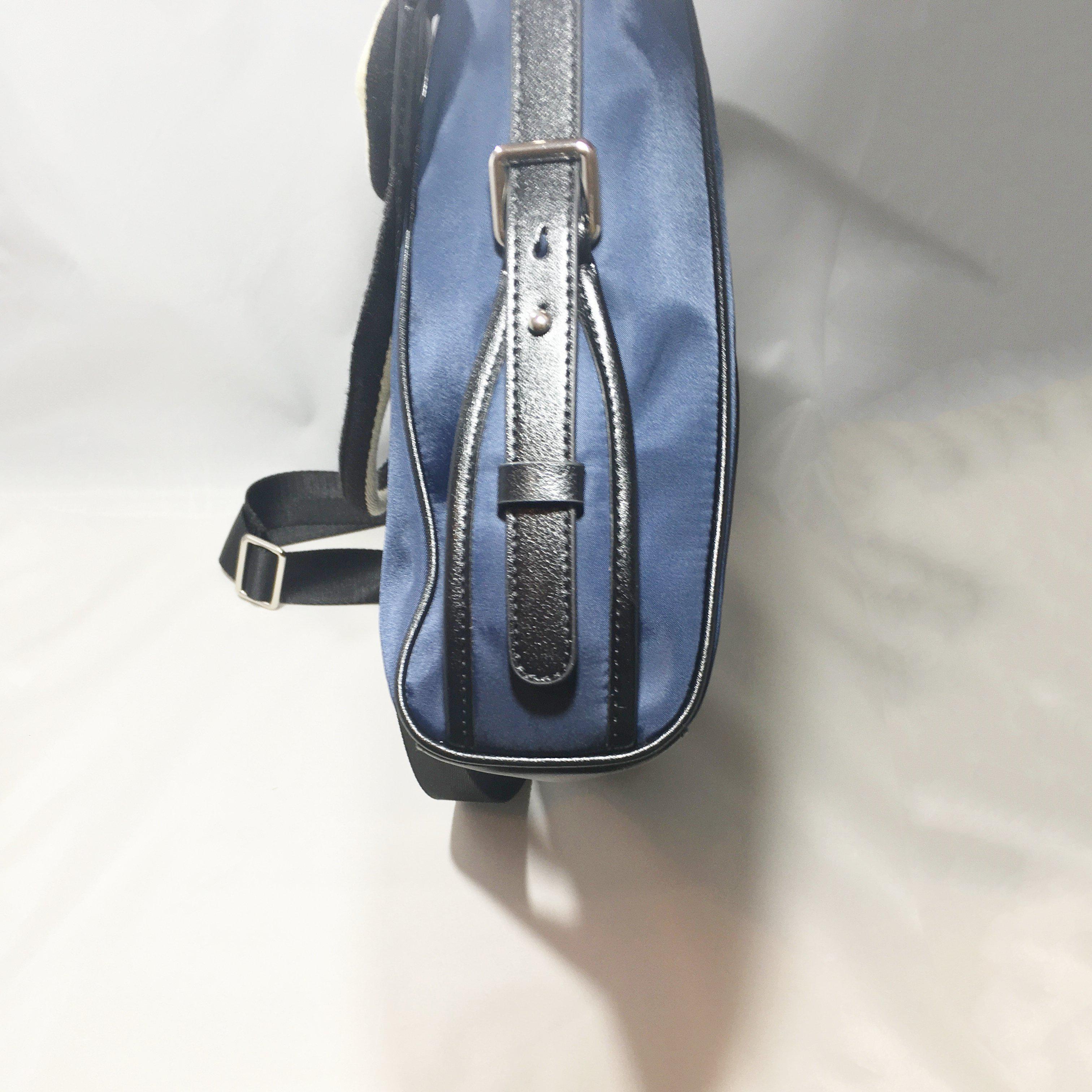 Sinclair Nylon laptop bag in navy color, showcasing its sleek design and spacious compartments, perfect for office use.