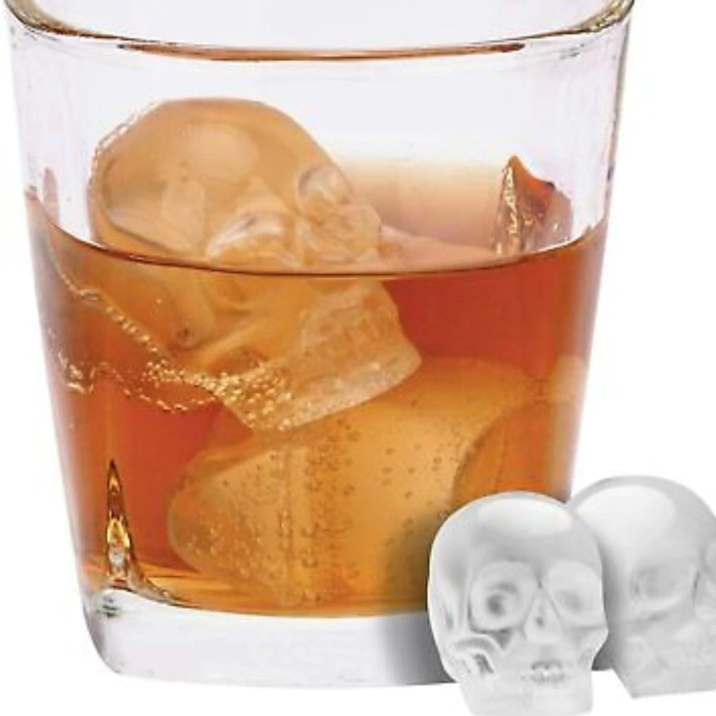 Skeleton skull shape ice cube mold made of silicone, designed to create spooky ice cubes for drinks, perfect for Halloween parties.