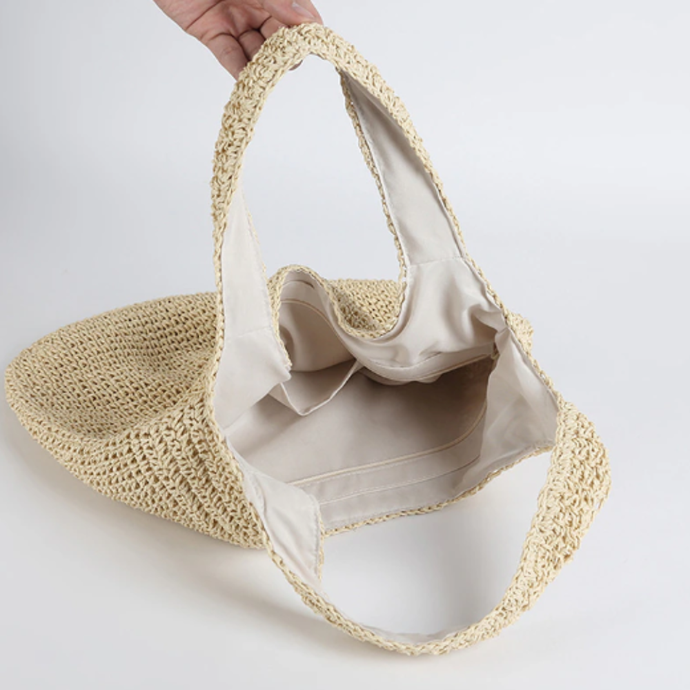 A stylish Summer Shoulder Straw Tote made of durable straw material, featuring a spacious interior and a trendy design, perfect for summer outings.