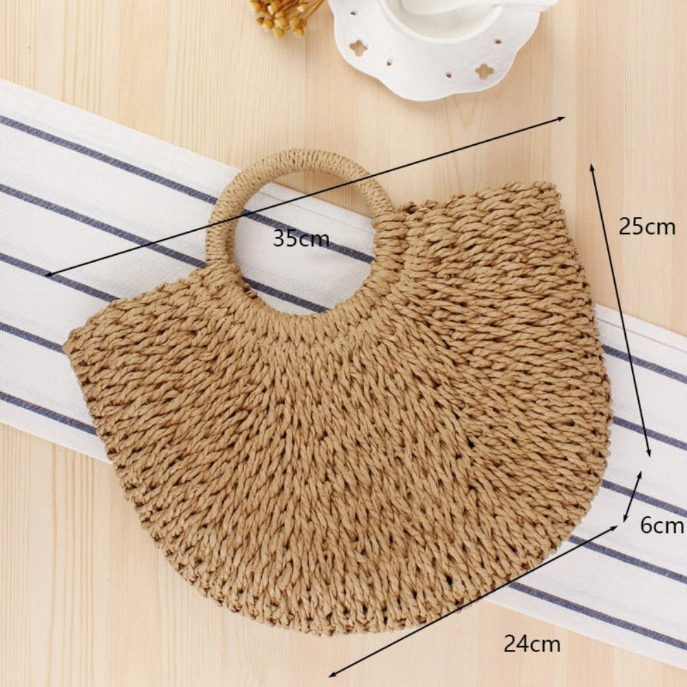 A stylish Summer Top Handle Semi Circle Straw Bag, showcasing its trendy semi-circle shape and lightweight straw material, perfect for summer outings.