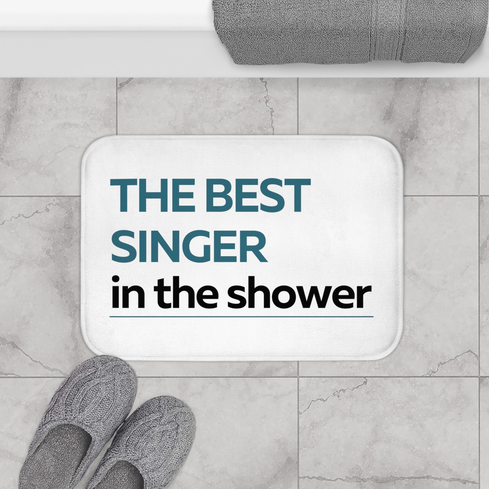 The Best Singer in The Shower Blue Bath Mat featuring a vibrant blue color and anti-slip backing, perfect for bathroom safety and style.