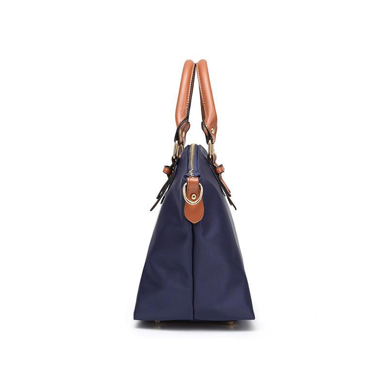 Two-piece set of stylish nylon cloth handbags for women, featuring a large and small bag in a modern design.