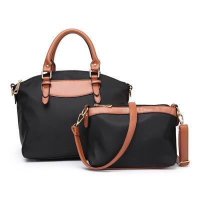 Two-piece set of stylish nylon cloth handbags for women, featuring a large and small bag in a modern design.