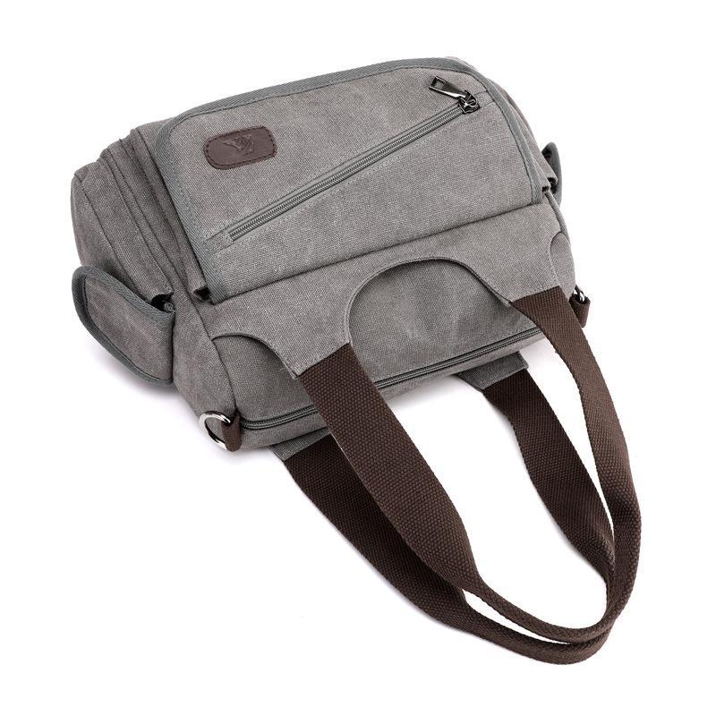 Unisex Casual Canvas Messenger Bag in a stylish design, showcasing its durable canvas fabric and spacious interior, perfect for trips.