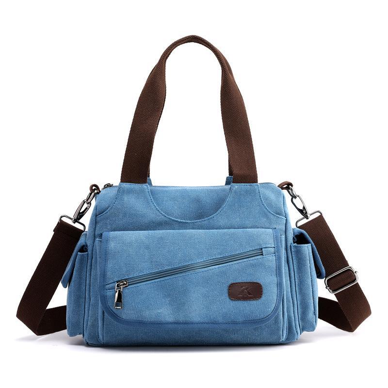 Unisex Casual Canvas Messenger Bag in a stylish design, showcasing its durable canvas fabric and spacious interior, perfect for trips.