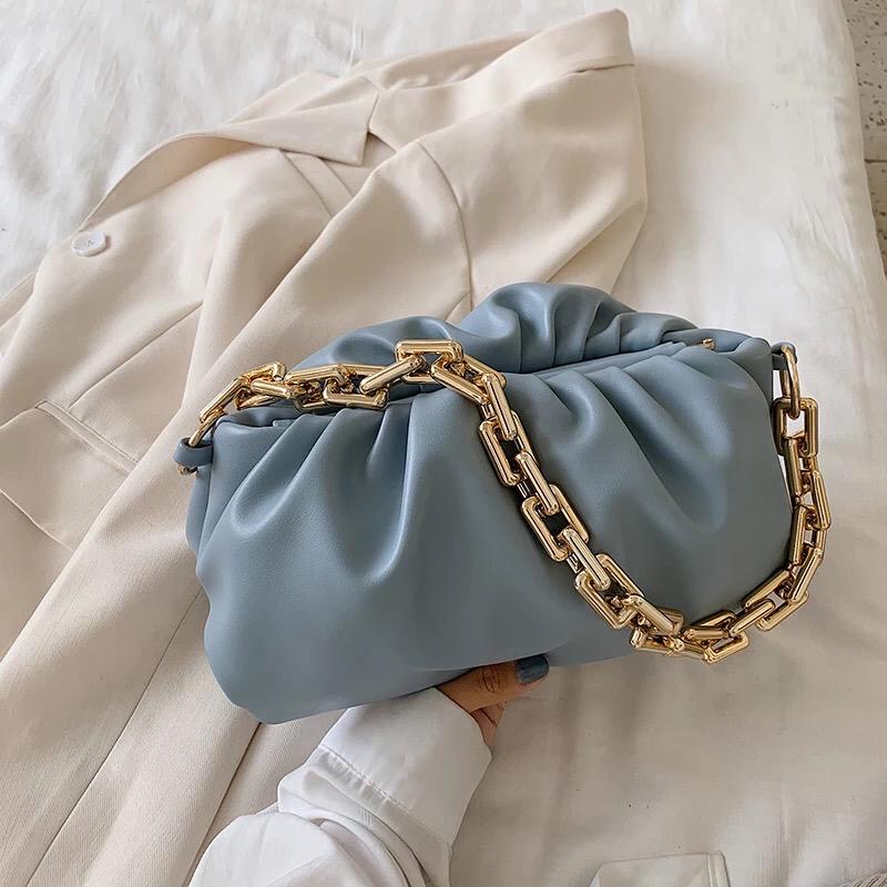 Vintage Cloud Clutch Handbag featuring a glossy finish and removable chain handle, available in multiple colors.