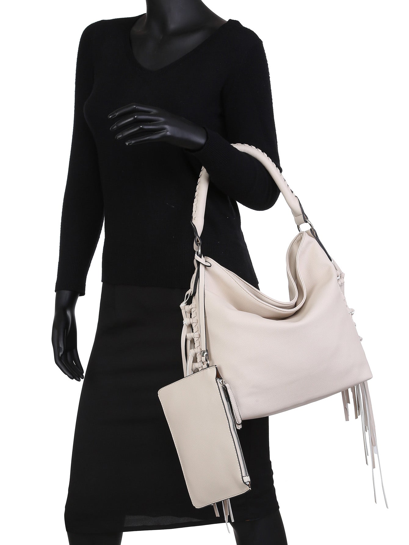 Women hobo bag with fringe design made from vegan leather, featuring a small pouch.