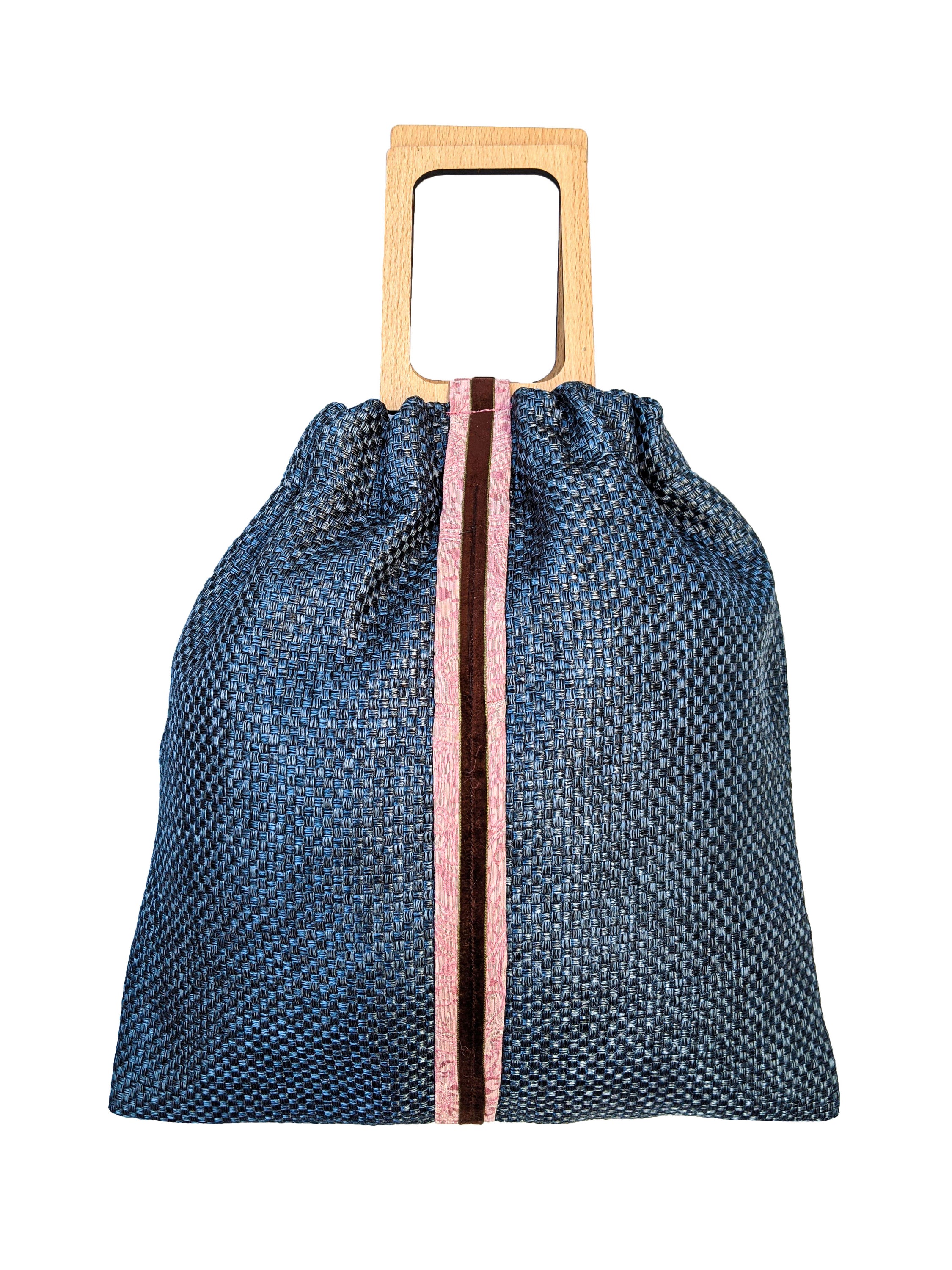 Wonderstone Jasper reversible pouch bag featuring navy blue cloth, ice blue lining, sateen and velvet stripes, and wooden handles.