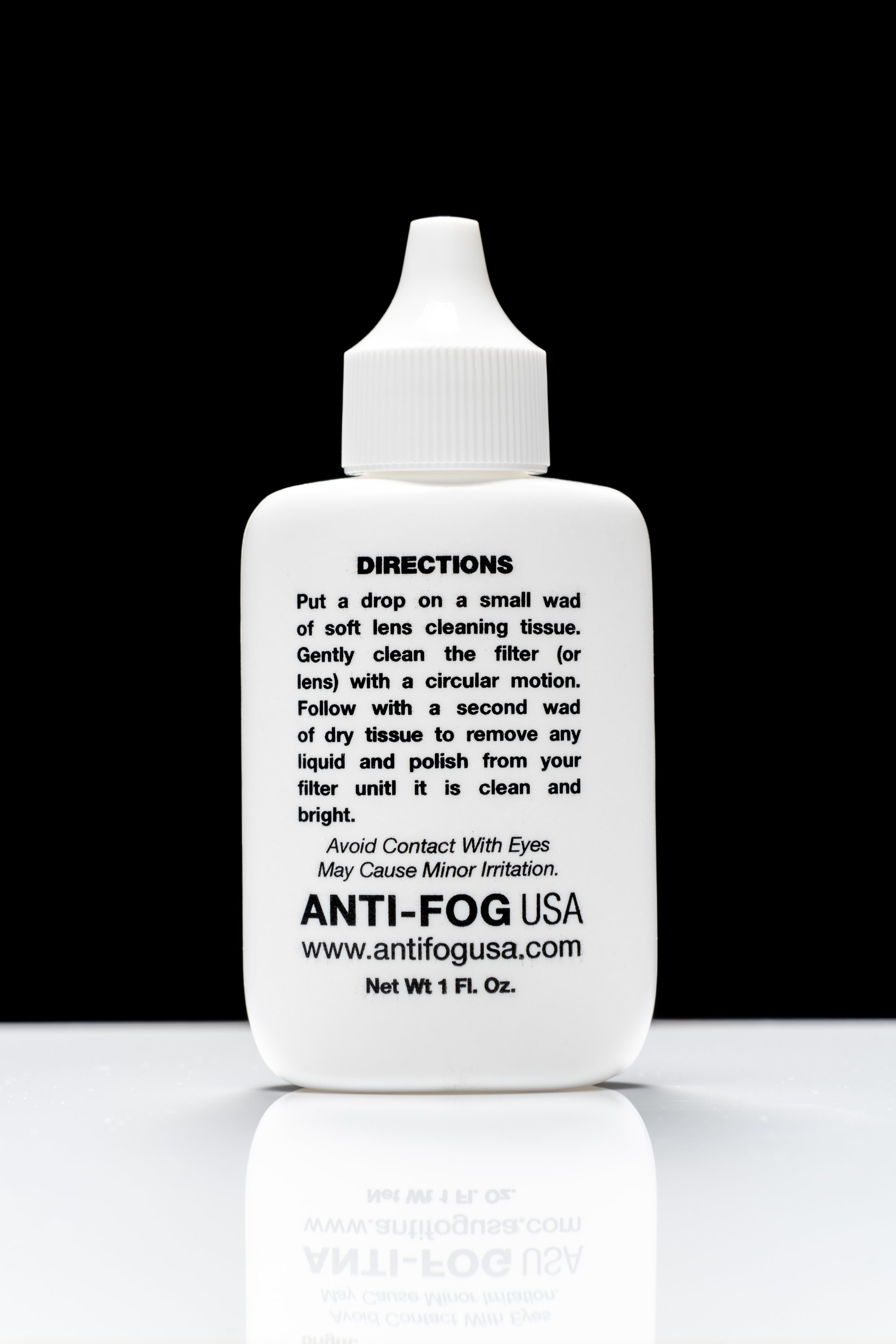 Anti-Fog Spray in a 1 oz. dropper bottle, designed for lens cleaning and fog prevention.