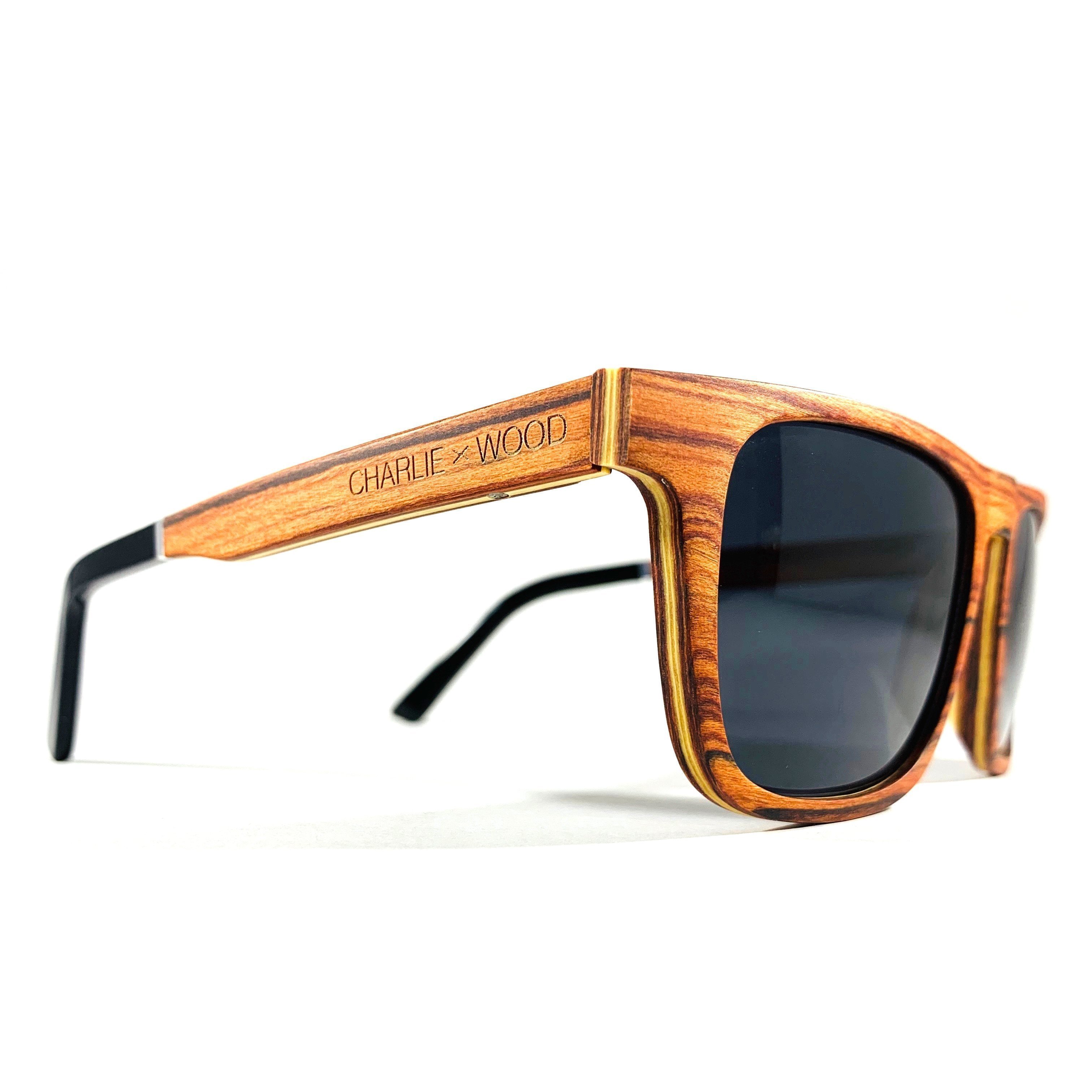 Brookwood sunglasses featuring elegant Brazilian rosewood frames and polarized gray lenses, perfect for stylish outdoor wear.