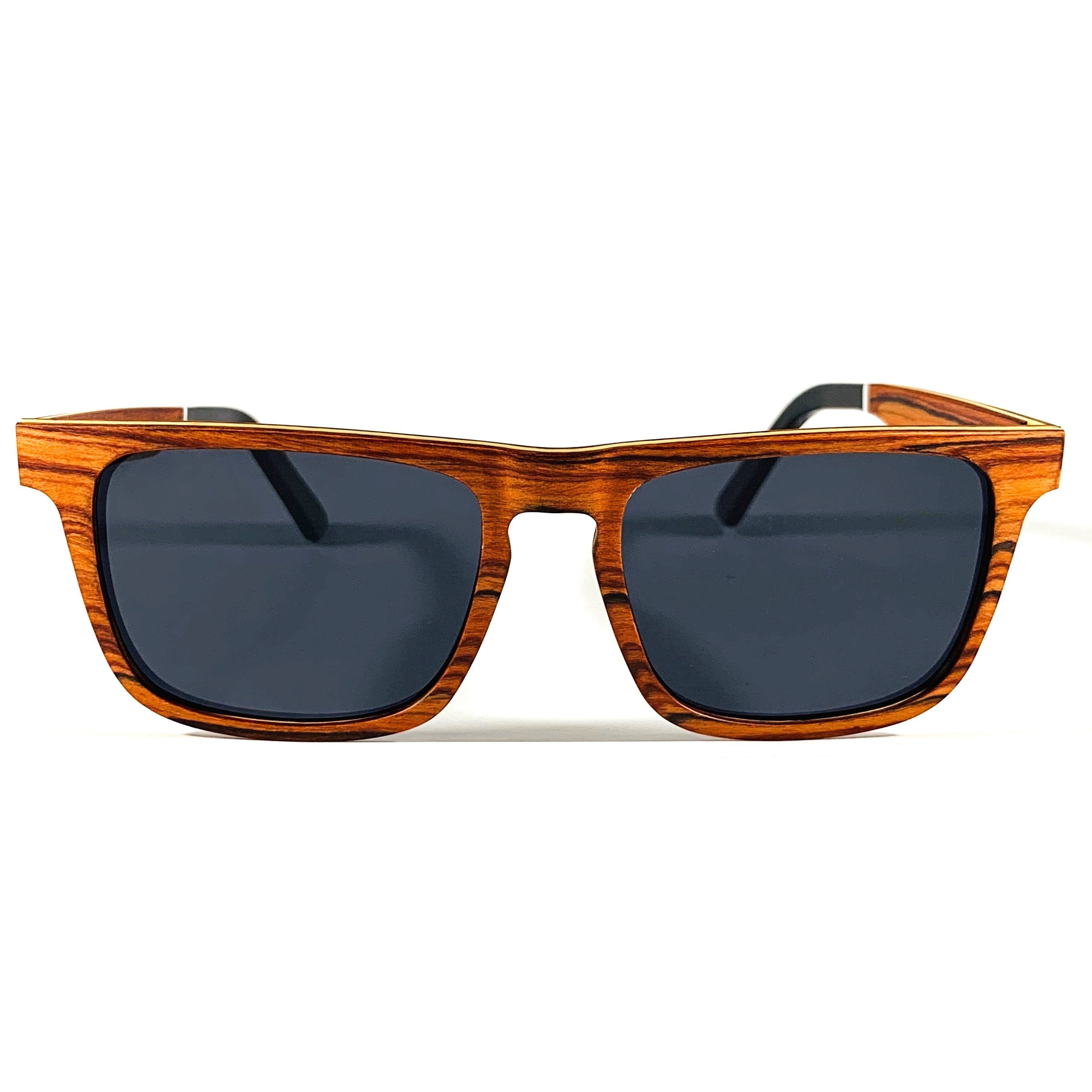 Brookwood sunglasses featuring elegant Brazilian rosewood frames and polarized gray lenses, perfect for stylish outdoor wear.