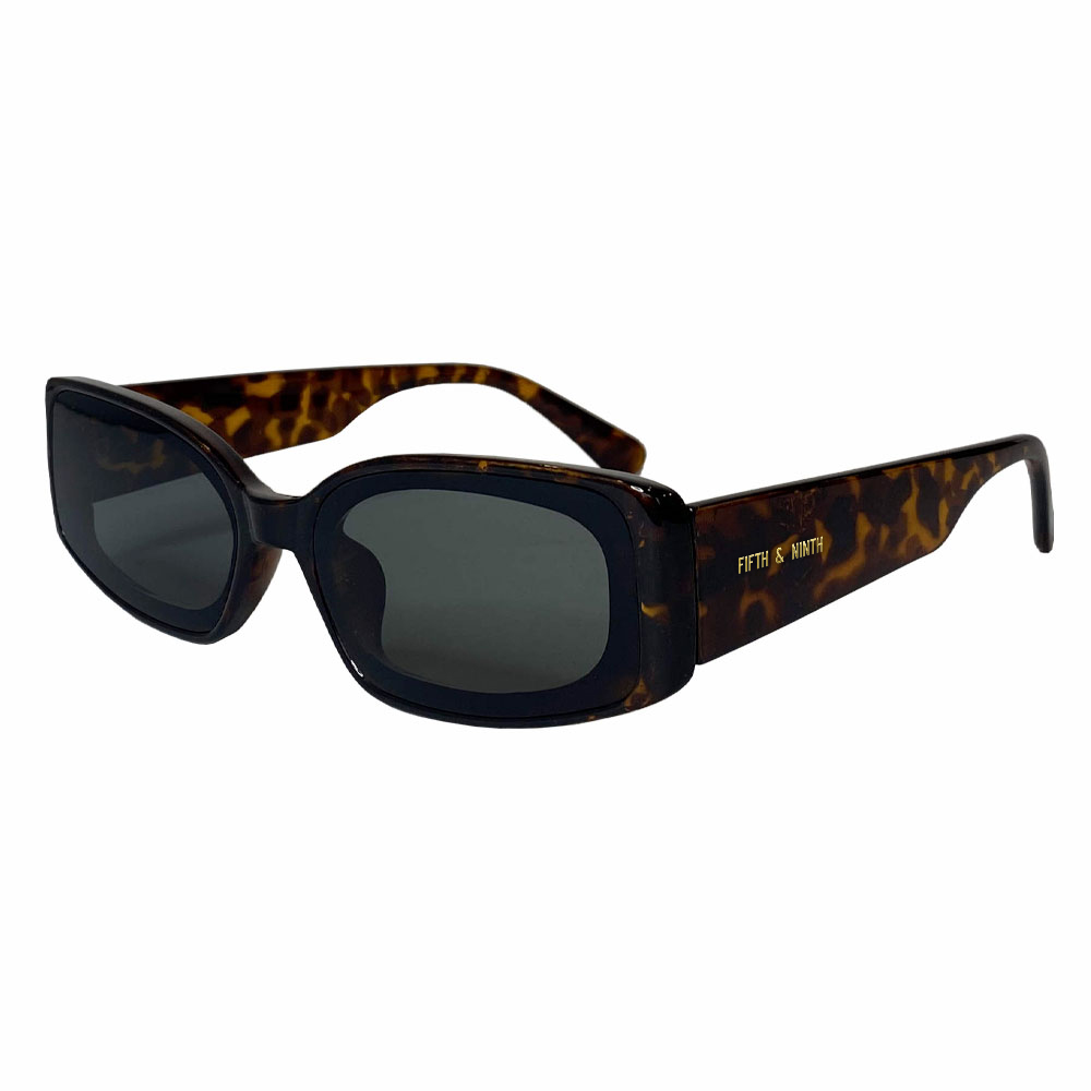 Cannes Sunglasses with stylish frame and UV protection, displayed with transparent travel case.