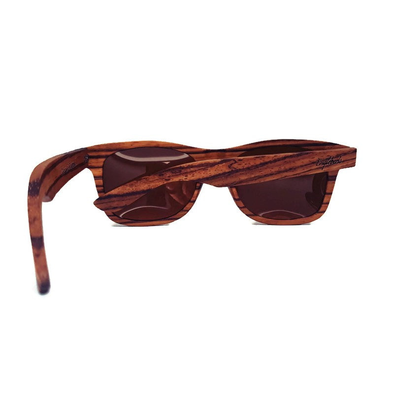 Cinnamon Swirl Skateboard Wood sunglasses with polarized lenses, showcasing unique wood grain and stylish design.