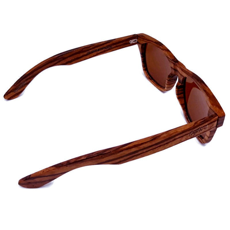 Cinnamon Swirl Skateboard Wood sunglasses with polarized lenses, showcasing unique wood grain and stylish design.