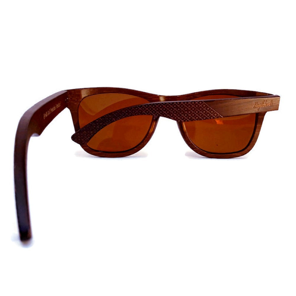 Engleberts Crimson Wooden Sunglasses with tea-colored polarized lenses, showcasing handcrafted wooden frame and stylish design.