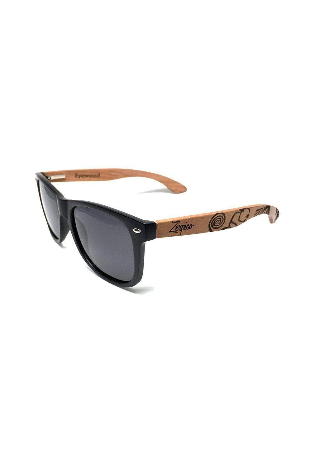 Eyewood engraved wooden sunglasses made from rosewood, featuring a Nazca pattern design on the temples, with polarized black mirror lenses.