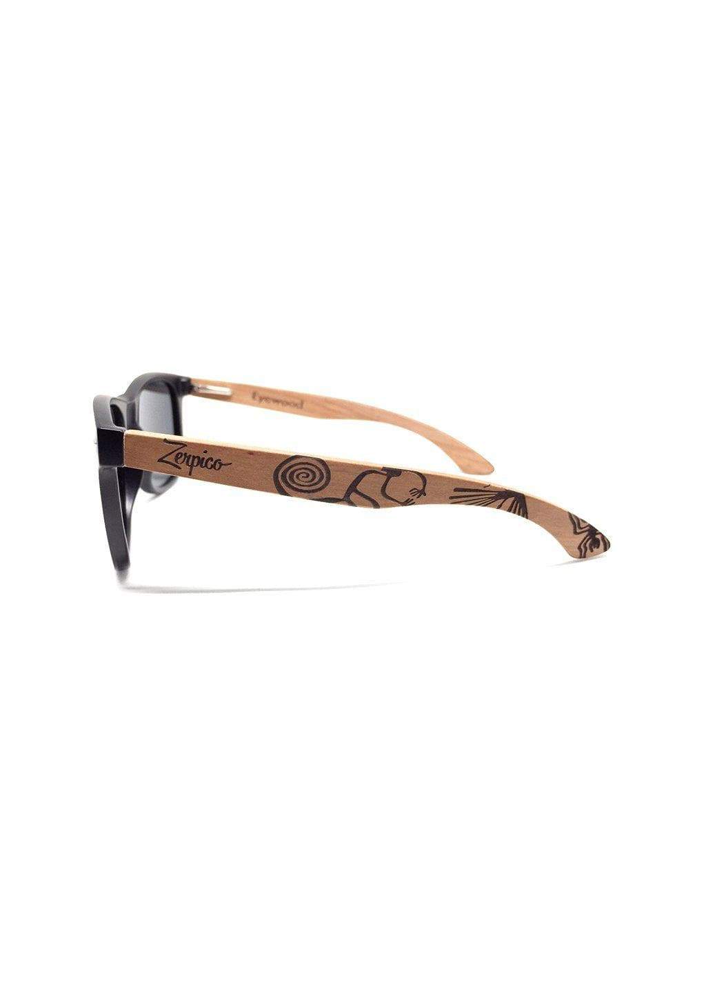 Eyewood engraved wooden sunglasses made from rosewood, featuring a Nazca pattern design on the temples, with polarized black mirror lenses.