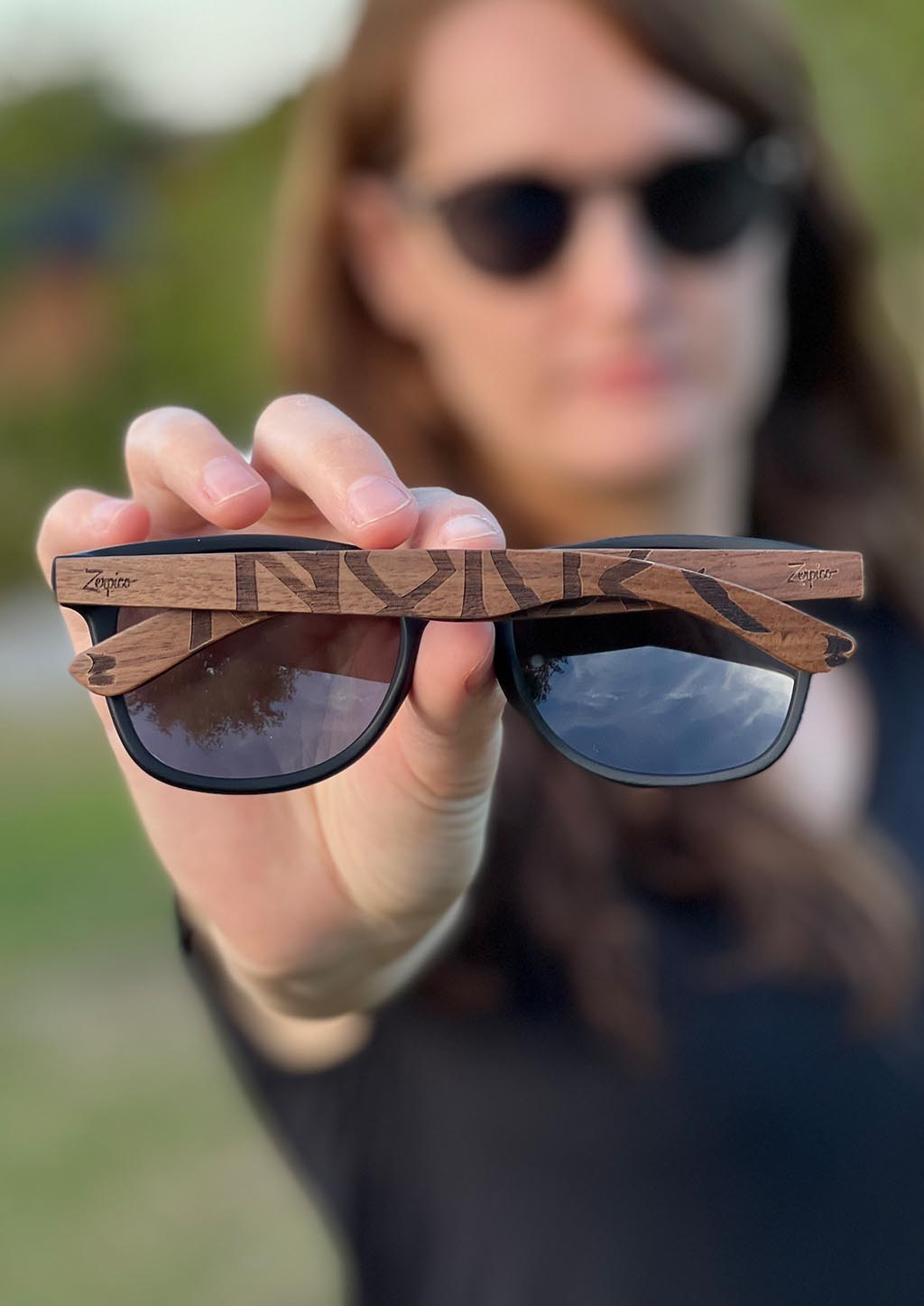 Eyewood engraved wooden sunglasses featuring Viking runes design, made from rosewood and plastic, showcasing a stylish and eco-friendly accessory.